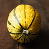 Yellow and green striped pumpkin