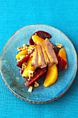 Duck breast on beetroot and orange salad with walnuts