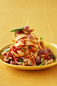 Tagliatelle with tomato sauce, ham and mushrooms