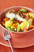 Peppered mackerel on potato and vegetable salad