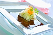 Steamed snow fish with papaya and cucumber in soy sauce