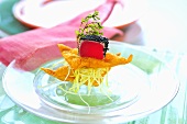 Tuna sashimi with mango salad and deep-fried pastries