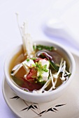 Miso soup with tofu and enoki mushrooms