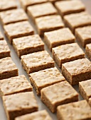 Basler Leckerli (spiced cookie squares) on baking tray