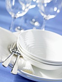 Porcelain tableware, spoons and wine glasses
