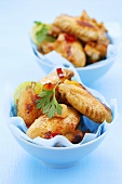 Chicken wings with soy sauce, chilli, garlic and coriander