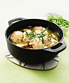 Chicken stew with white wine, onions and rosemary