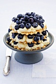 Waffles with cream and blueberries