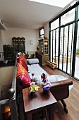 Living room with sofa and view of terrace