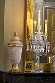 Elegant candle holder with burning candles