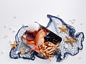 Still life with fish, seafood and fishing net