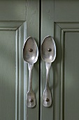 Spoons used as door handles