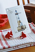 Tea towels with fish ornaments and card