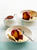 Poached peaches with raspberry sauce