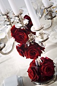 Elegant candelabrum with red roses
