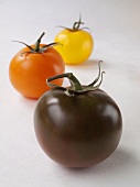 Three different tomatoes