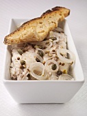 Matjes herring fillets with onions, capers and bread