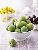 Greengages, cherries and mirabelles in bowls
