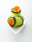 Cucumber rolls with trout caviar