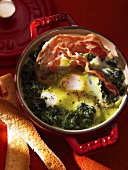 Baked eggs with spinach and bacon