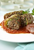 Savoy cabbage leaves stuffed with mince, with tomato sauce