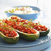 Courgettes stuffed with mince and diced tomatoes