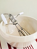 Hand mixer in bowl