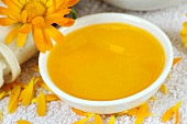 Marigold oil in small dish