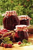 Three jars of raspberry jam