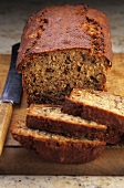 Banana and pecan bread, partly sliced