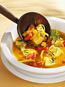 Fish soup with peppers and tomatoes