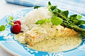 Salmon with herb sauce and green asparagus