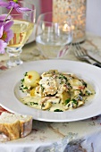 Chicken with onions and mushrooms in white wine