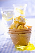 Vanilla and citrus fruit ice cream in stacked wafer cups