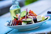 Greek salad with cucumber, tomatoes and feta cheese