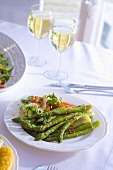 Green asparagus with vinaigrette & two glasses of white wine