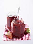 Two jars of strawberry jam