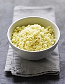 Couscous in bowl on cloth
