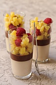 Chestnut and chocolate cream with pineapple and raspberries
