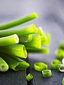 Spring onions, partly sliced