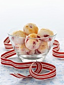 Cherry and coconut balls in glass bowl