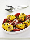 Fried tomatoes with corn on the cob