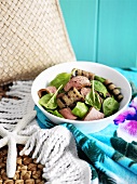 Spinach salad with grilled aubergine and lamb