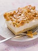 A piece of 'bee sting cake' with vanilla cream filling