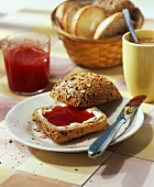 Rhubarb and berry spread on wholemeal roll