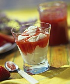 Cream dessert with strawberry and melon sauce