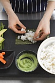 Spread rice on nori sheet (for maki sushi)