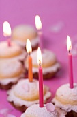 Madeleines with candles and rose petals