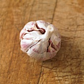 A garlic bulb on a wooden background