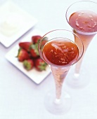 Champagne cocktail with strawberry liqueur and grenadine